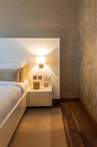 Postel nebo postele na pokoji v ubytování Remal Hotel