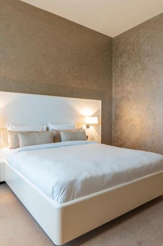 Postel nebo postele na pokoji v ubytování Remal Hotel