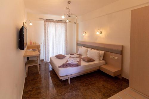 Cama o camas de una habitación en Voula Resort