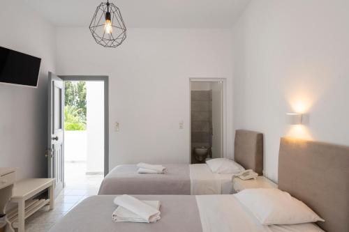 Ένα ή περισσότερα κρεβάτια σε δωμάτιο στο Galinos Hotel for adults only