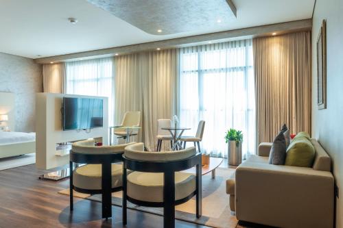 TV a/nebo společenská místnost v ubytování Remal Hotel