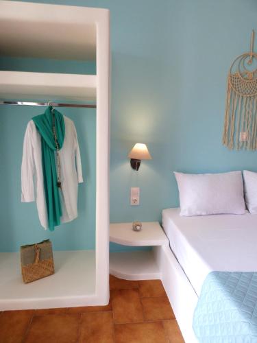 Postel nebo postele na pokoji v ubytování Tasoula Guest House