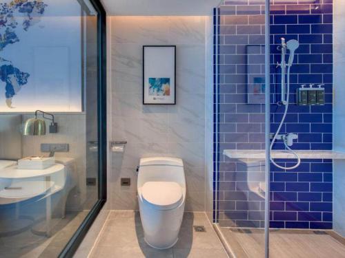 Ένα μπάνιο στο Kyriad Hotel Pingxiang Wanlong Bay Branch