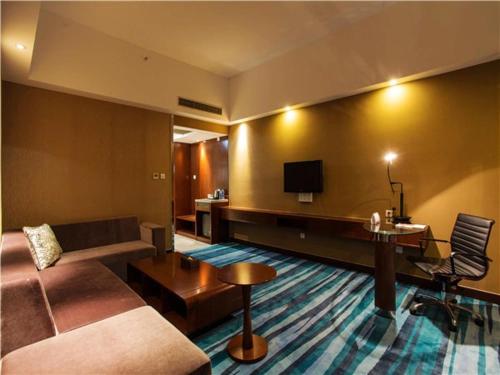 Televisyen dan/atau pusat hiburan di Metropolo Hotel Zhenjia Wanda Plaza Railway Station