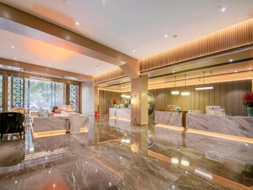Ο χώρος του λόμπι ή της ρεσεψιόν στο Kyriad Marvelous Hotel Changsha Furong Plaza Railway Station
