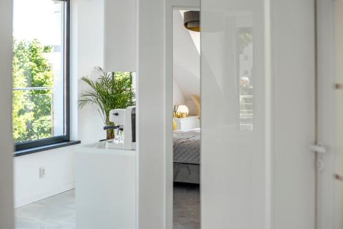 Postel nebo postele na pokoji v ubytování Apartamenty Z Widokiem Na Mazury Jezioro Czos Sauna Jacuzzi