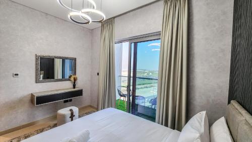 a hotel room with a bed and a large window at STAY BY LATINEM Luxury 2BR Holiday Home CV B601 near Burj Khalifa in Dubai