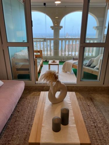 a room with a room with a view of the ocean at Kailua Dream in Almerimar