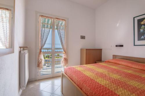 Ένα ή περισσότερα κρεβάτια σε δωμάτιο στο Residence Villa Alda
