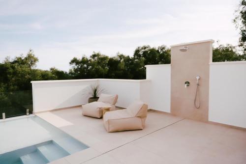Бассейн в Merelia Exclusive Villas Parga или поблизости