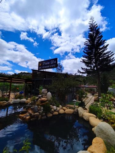 a large pond in front of a building at GREENECO DA LAT HOTEL - Khách sạn Green Eco Đà Lạt in Da Lat