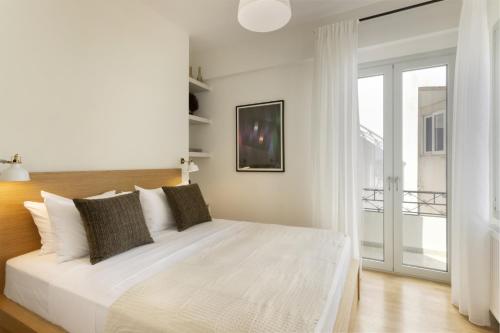 Versi2- Stylish 1BR pays homage to timeless charm