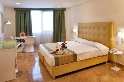 Katil atau katil-katil dalam bilik di Mercure Villa Romanazzi Carducci Bari