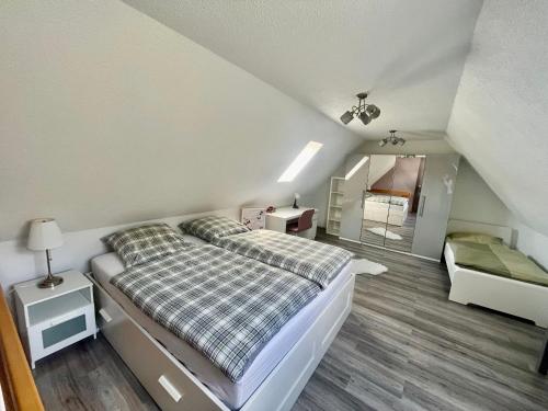 מיטה או מיטות בחדר ב-An der Aubach