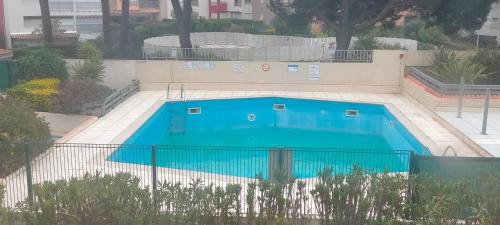 an overhead view of a swimming pool at Studio Cap d'Agde la grande voile in Cap d'Agde