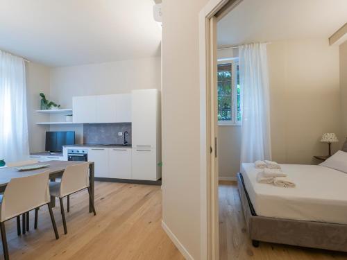 Кровать или кровати в номере I Host Apartment - Ranzoni 2