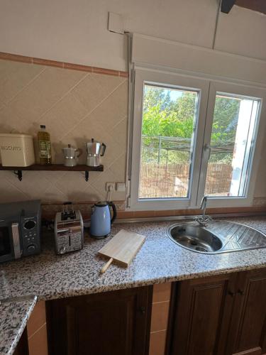 Una cocina o cocineta en Casa Barcelo El Chorro