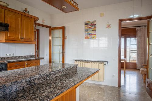 Kuchyň nebo kuchyňský kout v ubytování AT029 Piscina privada, barbacoa, playa a 10 min a pie