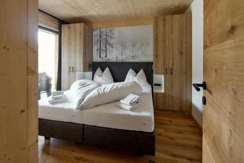 Alm-Lodges Montafon by Pferd auf Wolkeにあるベッド