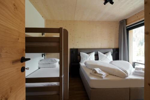 Alm-Lodges Montafon by Pferd auf Wolkeにあるベッド