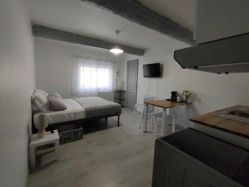 Postel nebo postele na pokoji v ubytování Studio Entier