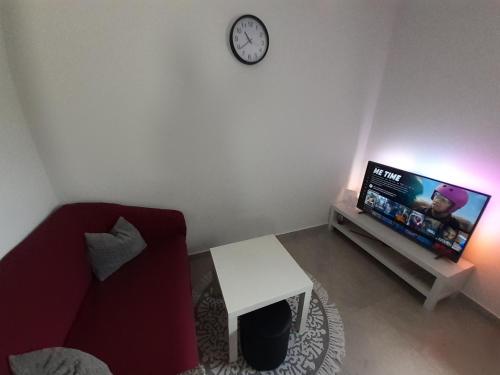 TV a/nebo společenská místnost v ubytování Apartman Sunset