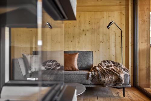 Alm-Lodges Montafon by Pferd auf Wolkeにあるシーティングエリア