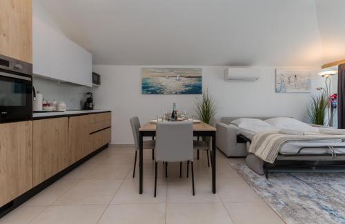 Køkken eller tekøkken på Garden Palace - Dorothy Supreme Apartment