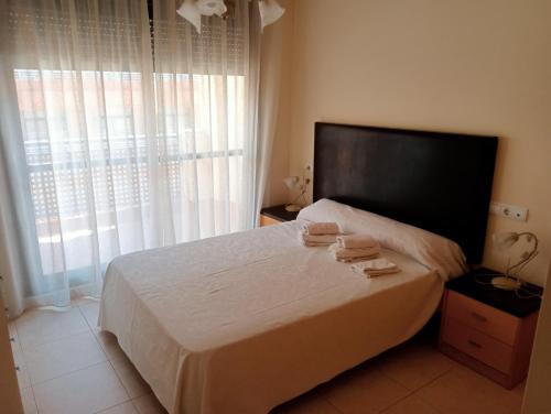 Postel nebo postele na pokoji v ubytování Vera Albacora V Costa Rey