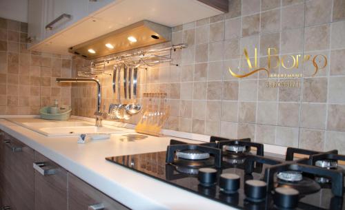 Η κουζίνα ή μικρή κουζίνα στο Al Borgo Apartment