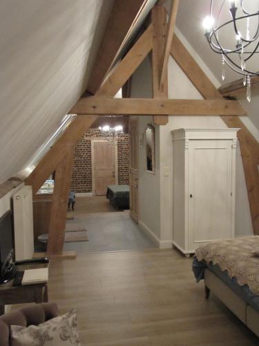 Una cama o camas en una habitación de B&B In 't Stille Weg