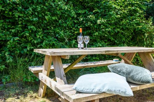 Κήπος έξω από το Gezellig Chalet aan de Veluwse bosrand