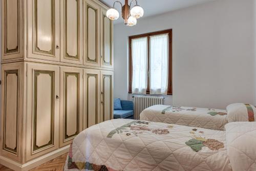 Postel nebo postele na pokoji v ubytování Gigli di Firenze
