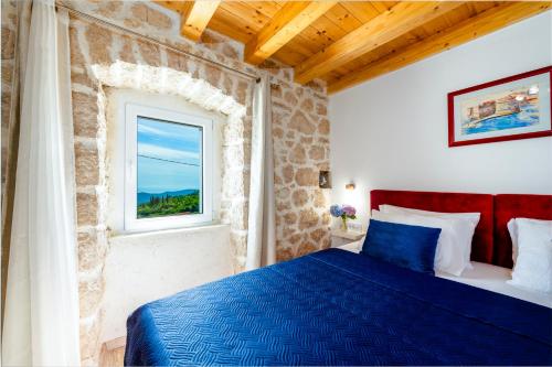 Postel nebo postele na pokoji v ubytování Villa Royal House