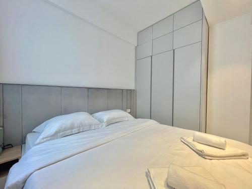 Postel nebo postele na pokoji v ubytování Horizon Residences Andjela