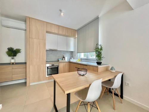 Kuchyň nebo kuchyňský kout v ubytování Horizon Residences Andjela