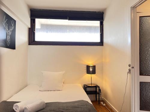 En eller flere senge i et værelse på Three Bedroom Apartment In Rdovre, Trnvej 45b,
