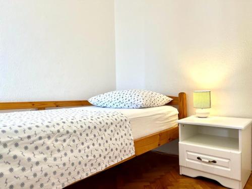 Postel nebo postele na pokoji v ubytování Apartments Juric