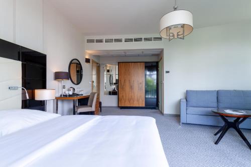 Postel nebo postele na pokoji v ubytování Diune Hotel by Zdrojowa