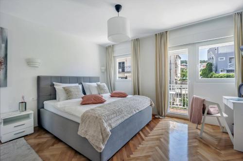 Postel nebo postele na pokoji v ubytování Apartments Batista