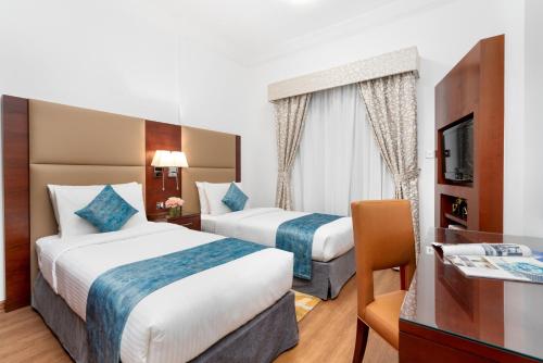  Golden Sands Hotel & Residences -  Room  picture :   Tea/Coffee maker    Internet facilities    Minibar                           