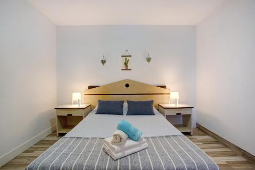 Posteľ alebo postele v izbe v ubytovaní Funchal Boa Nova Apartment