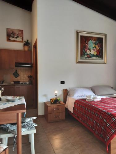 Postel nebo postele na pokoji v ubytování Agriturismo la Casetta