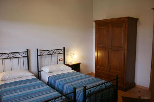 Postel nebo postele na pokoji v ubytování VILLA ABA