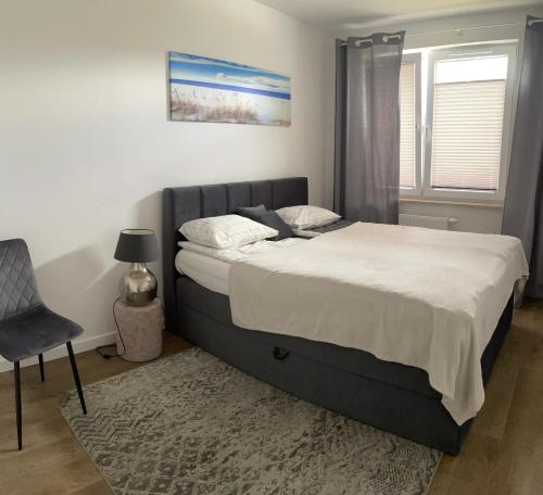 Postel nebo postele na pokoji v ubytování Apartament Tęczowa