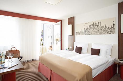 Postel nebo postele na pokoji v ubytování Best Western Hotel Nürnberg City West