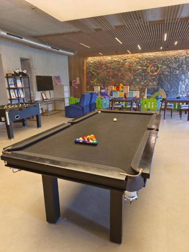 a ping pong table in a childrens play room at Radisson Resort and Spa Lonavala in Lonavala