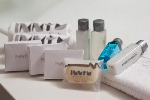 a group of products sitting on top of a counter at Inntu Hotel in Medellín
