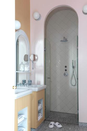 a bathroom with a shower and a sink at Il Palazzo Experimental in Venice