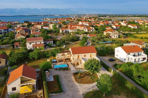 an aerial view of a small town with houses at Villa Gland in Nin